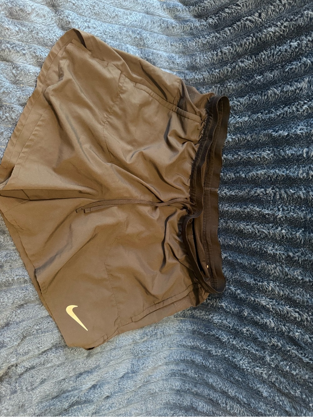 Nike Brown Running Shorts with White Swoosh